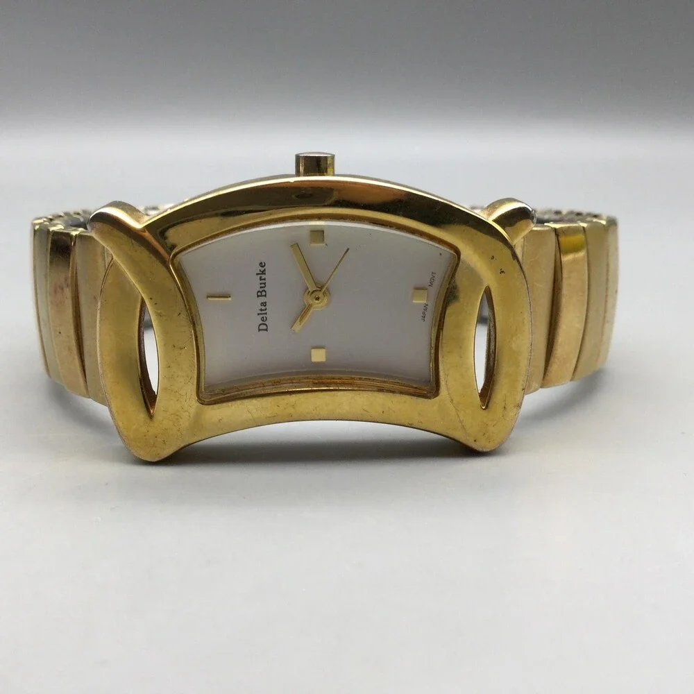 Delta Burke Womens Watch 25mm Gold Tone Asymmetrical Stretch Band New Battery